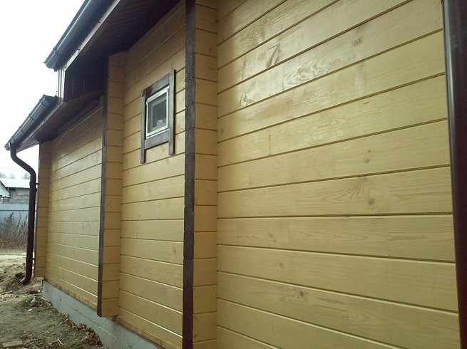 Покраска дома из клееного бруса снаружи лазурями Remmers