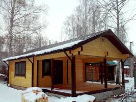 Покраска дома из клееного бруса снаружи лазурями Remmers